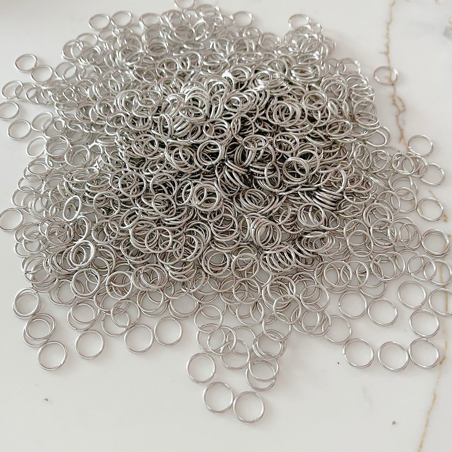 200g of 10mm silver colour jump rings
