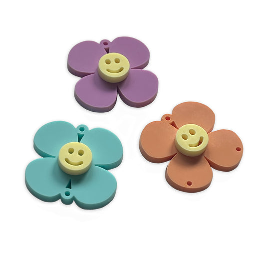 4 point flower smiley face charm