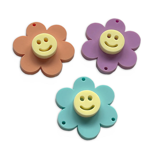 6 point flower smiley face charm