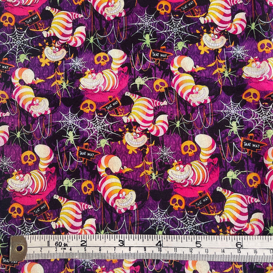 Large offcut Alice Cheshire cat fabric