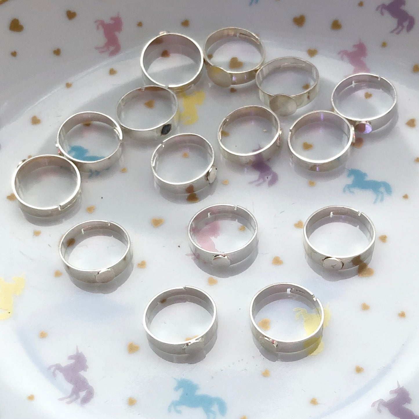 6 silver colour ring backs