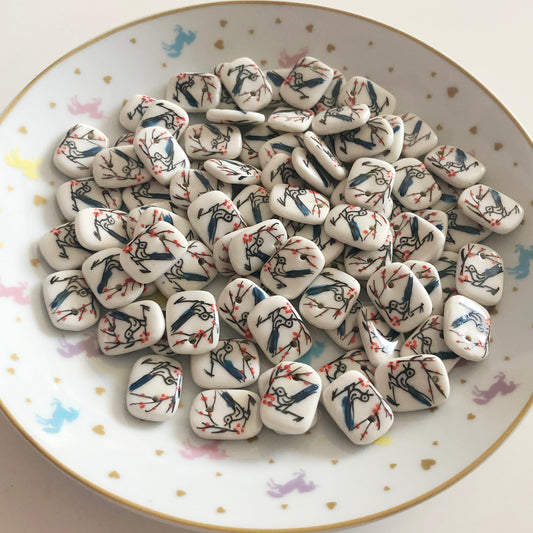 4 porcelain bird and blossom tile charms