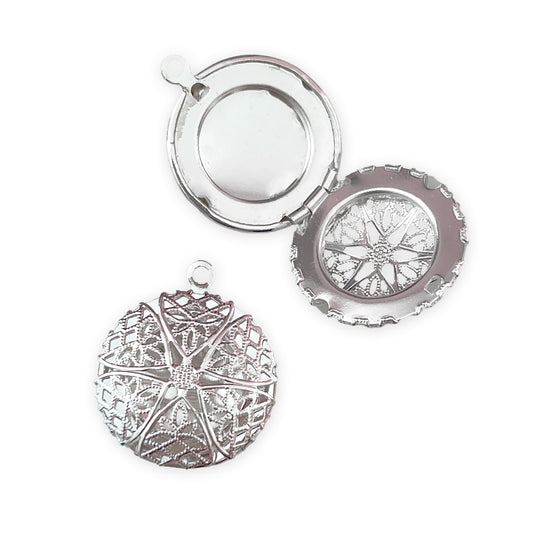 2 x Circle lockets with cut-out lace detail, silver colour