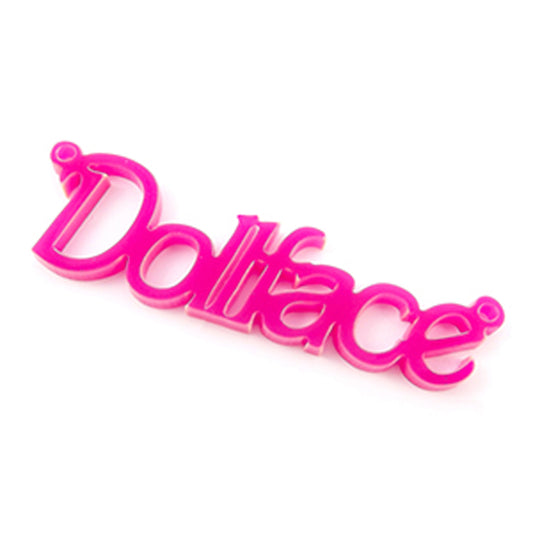 Dollface laser cut word charm