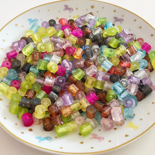 10 transparent tube beads with glitter strands inside