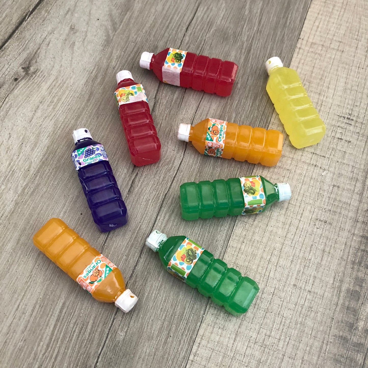 8 x juice bottle charms, possible b-grade