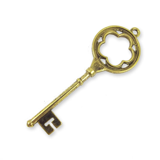 Large gold colour key charm with flower detail top