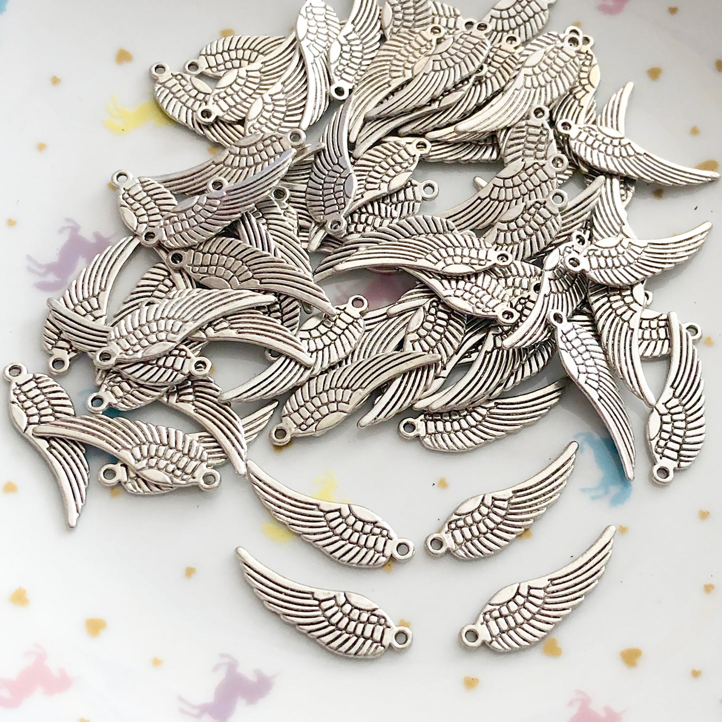 10 mirrored angel wings Tibetan charms