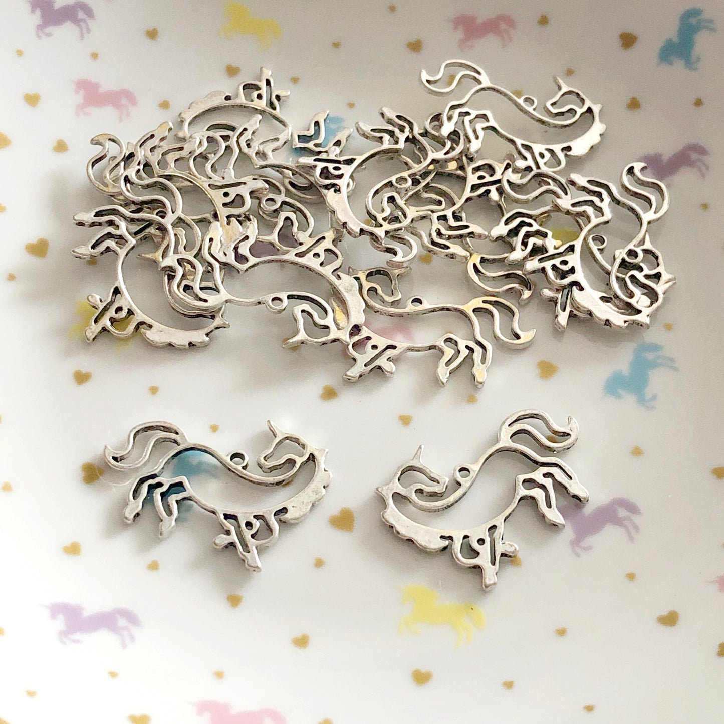 4 silver colour unicorn metal charms