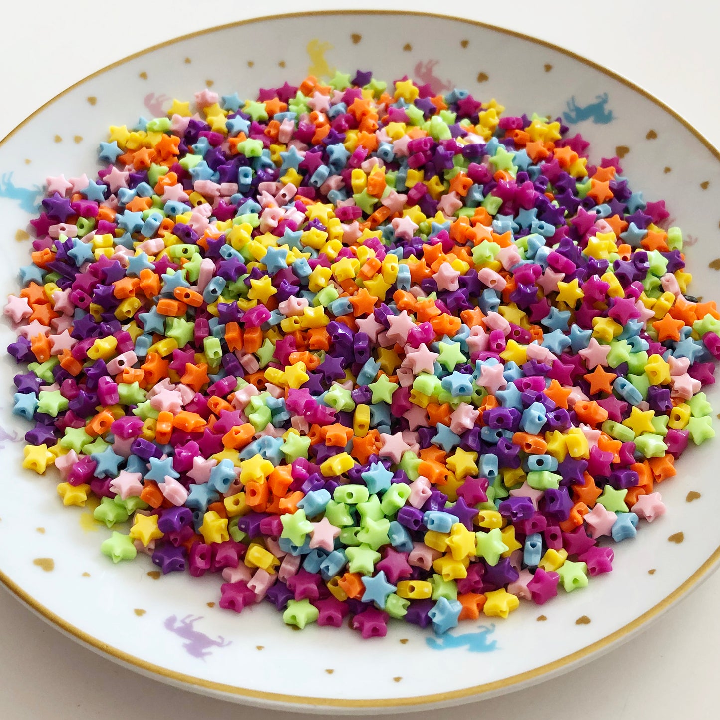 40 mini plastic star beads