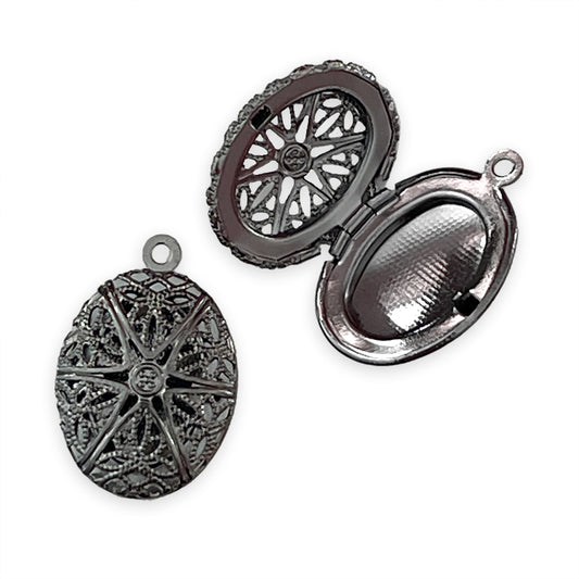 2 x Oval lockets with cut-out lace detail, gun metal colour