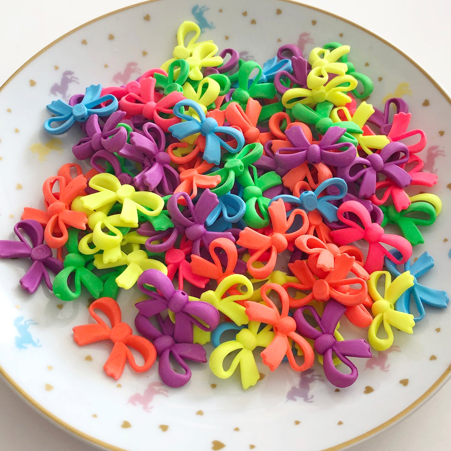 10 Bow knot beads, neon