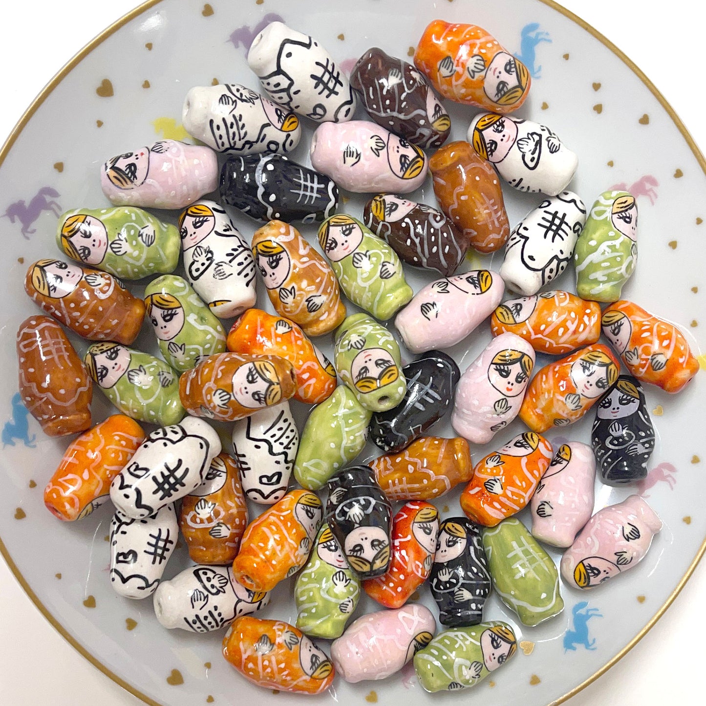 2 porcelain Russian doll beads