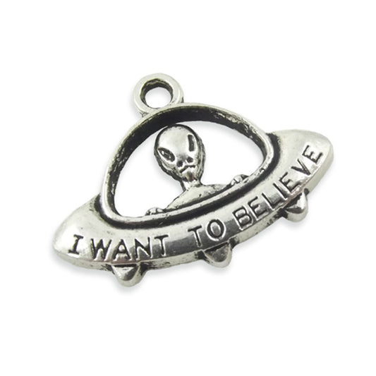 2 x I want to believe alien charms, silver colour