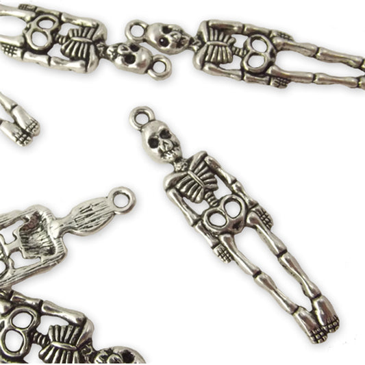 5 skeleton silver colour charms