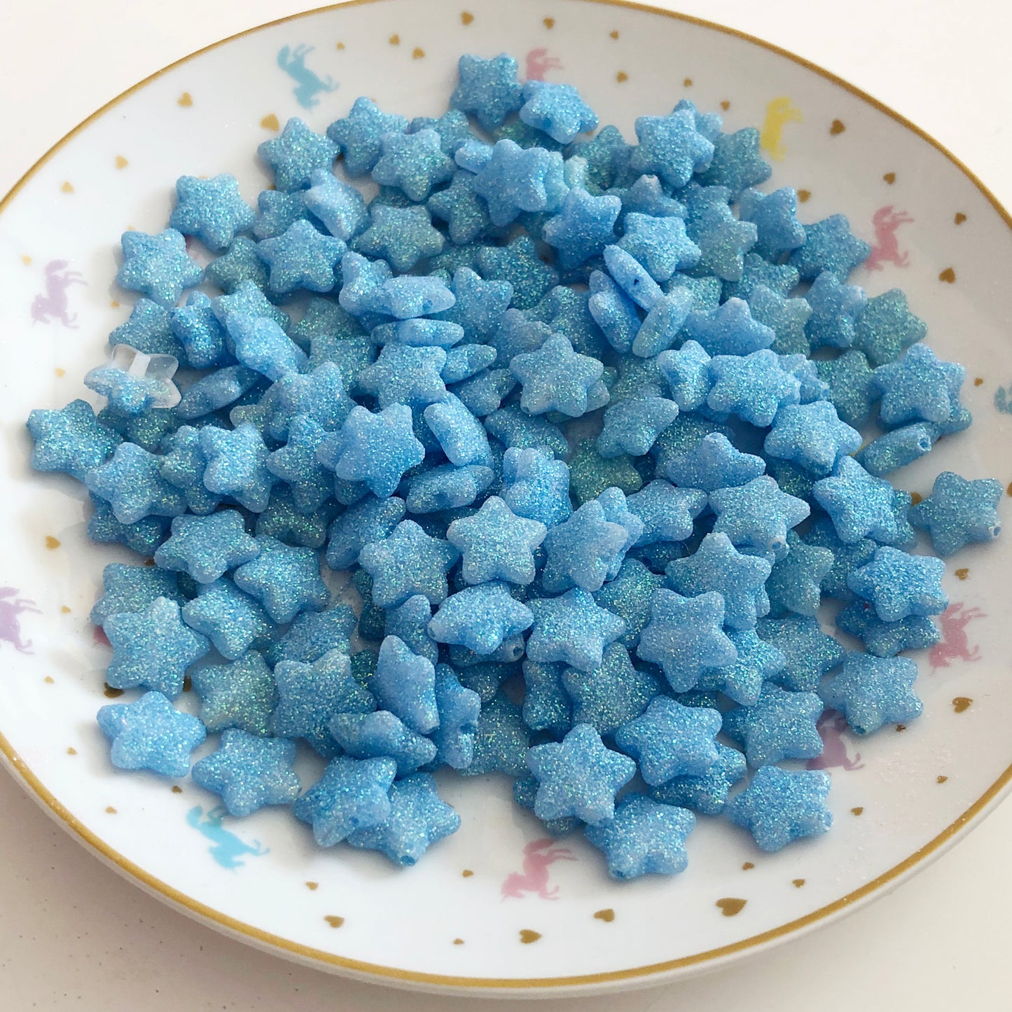 10 star glittery blue beads