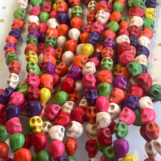 15 synthetic turquoise skull beads