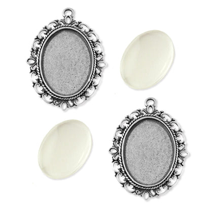 4 Large frame fancy oval settings and cabochons, silver colour