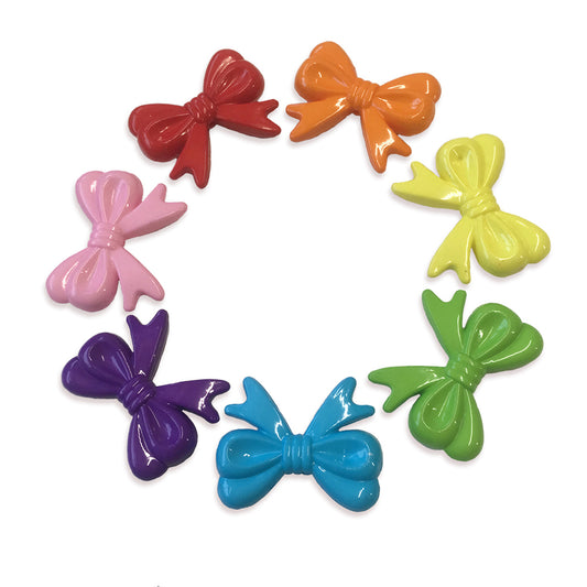 4 large opaque bow shape beads