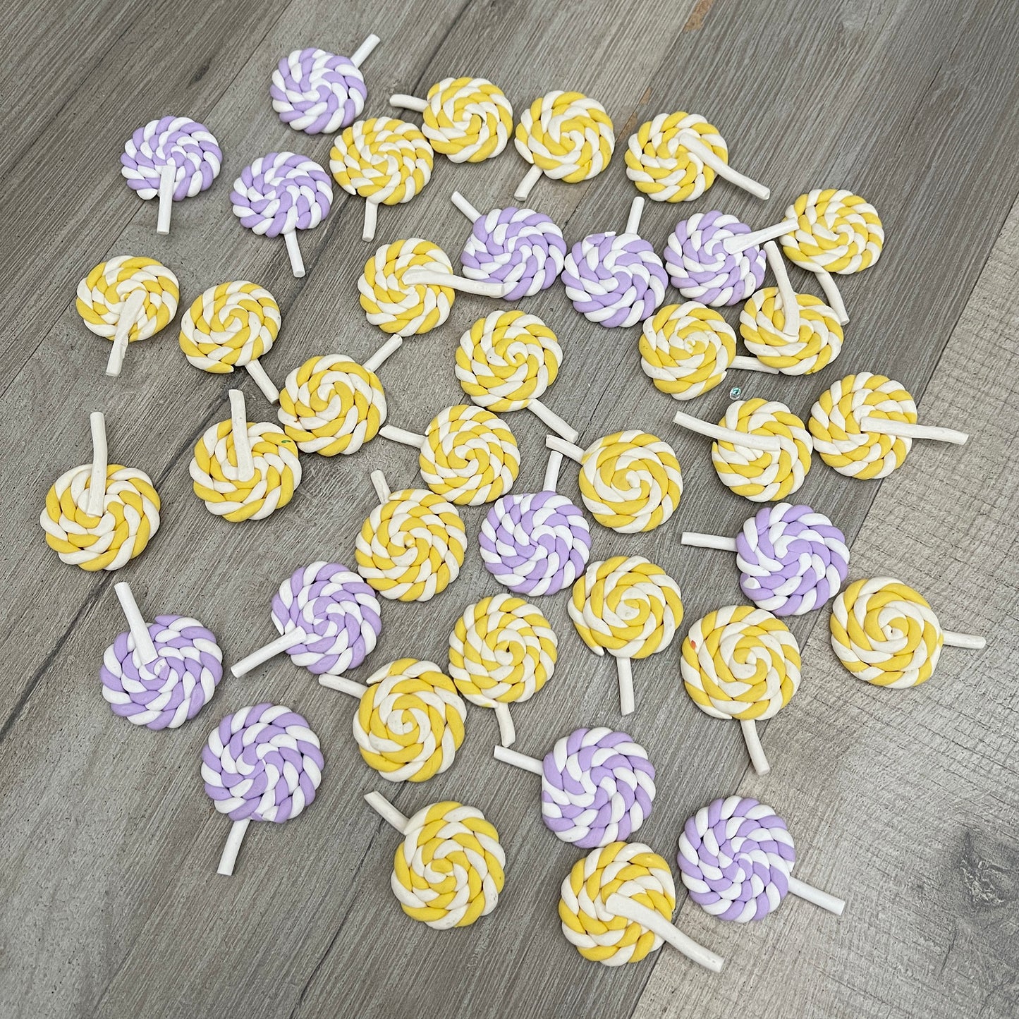 38 x purple and yellow lollipop cabochons, polymer clay