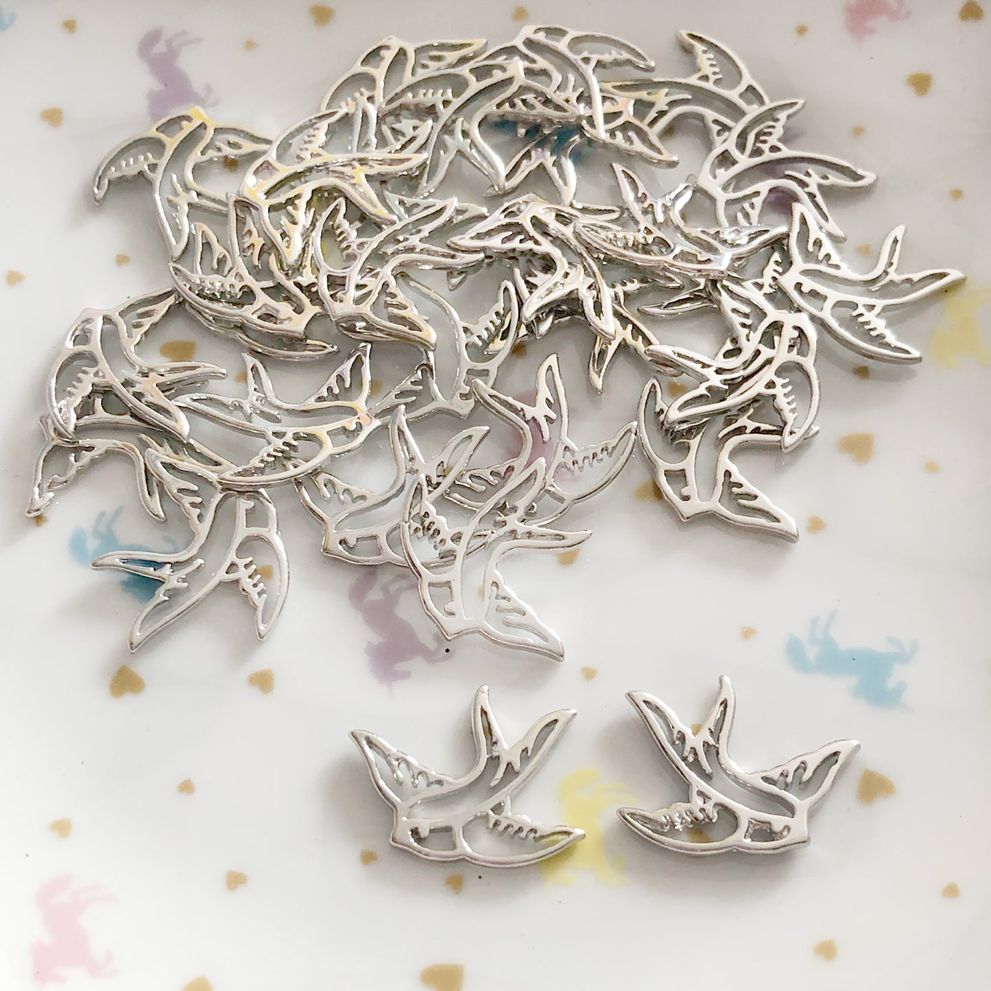 6 silver colour swallow charms